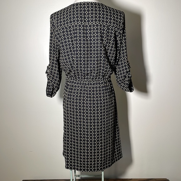 Skies are blue black & beige dress. - Picture 4 of 7